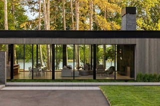 A modern home on Lake Minnetonka with Marvin Modern Multi Slide Doors and Marvin Modern Direct Glaze windows.