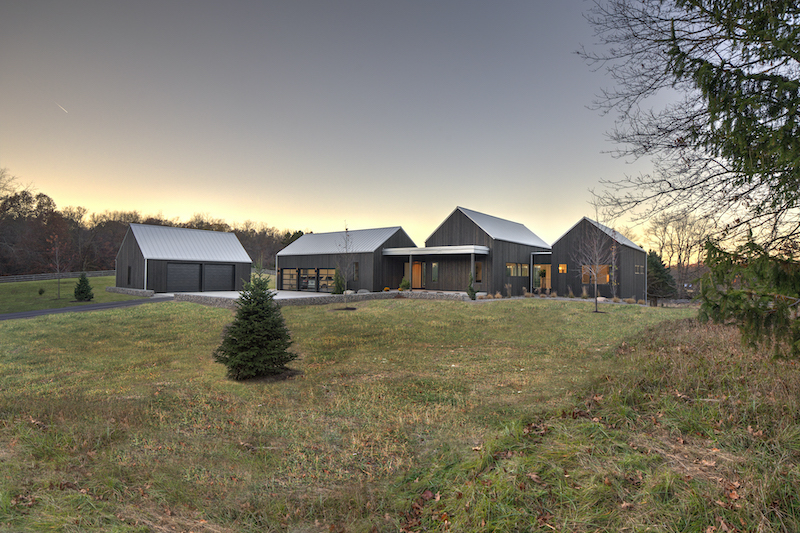 Exterior of Hilltop Farm in Grand Rapids, Michigan, by Hygge Custom Homes, featuring Marvin Essential windows and doors.