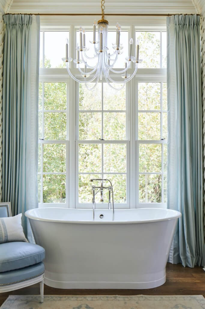 Traditional style bathroom with large Marvin Window