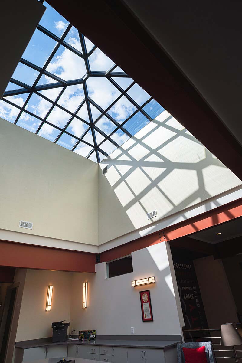 Custom skylight and natural light in office space.