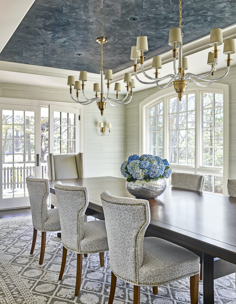 A dining room in the This Old House Cape Ann home in Manchester by the Sea, featuring Marvin windows.