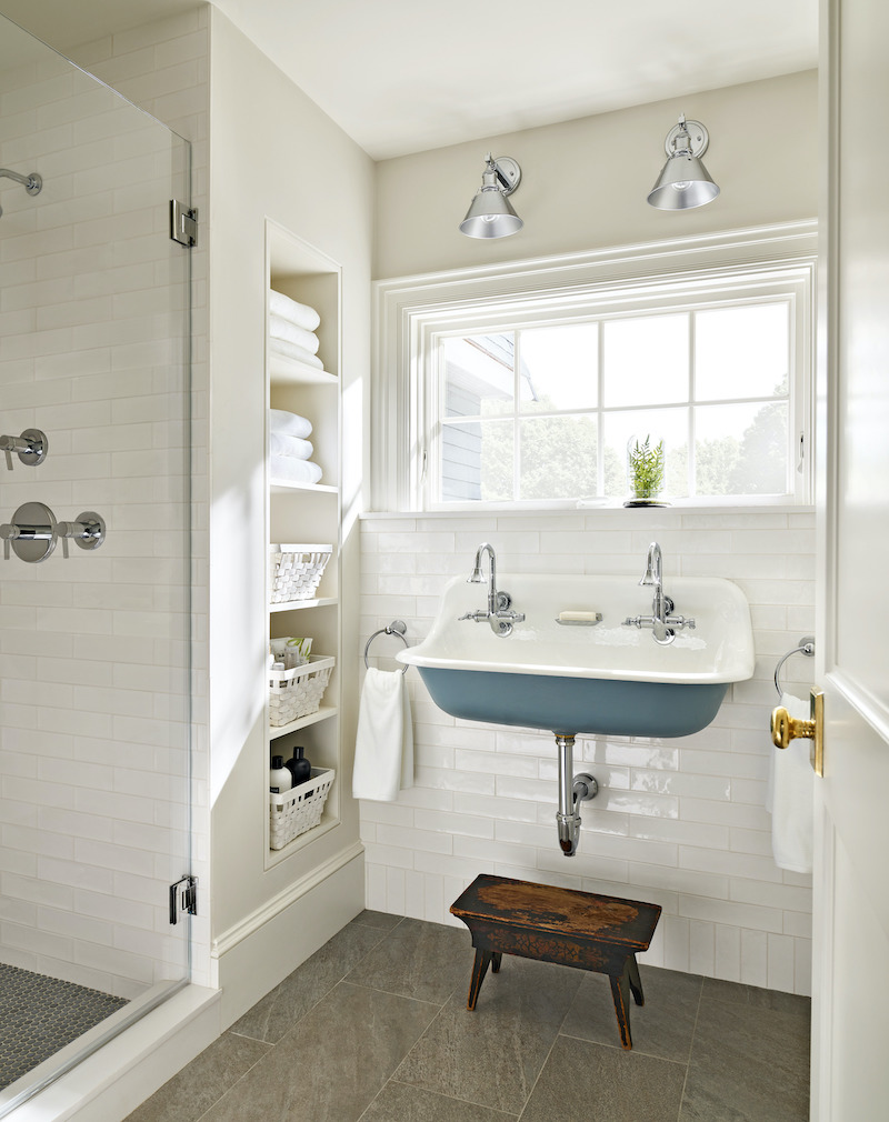 A bathroom in the This Old House Cape Ann home in Manchester by the Sea, featuring Marvin windows.