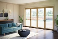 Living room with closed Elevate Bi-Fold Door