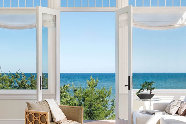 Beautiful Ocean View From Living Room With Signature Ultimate Swinging French Doors