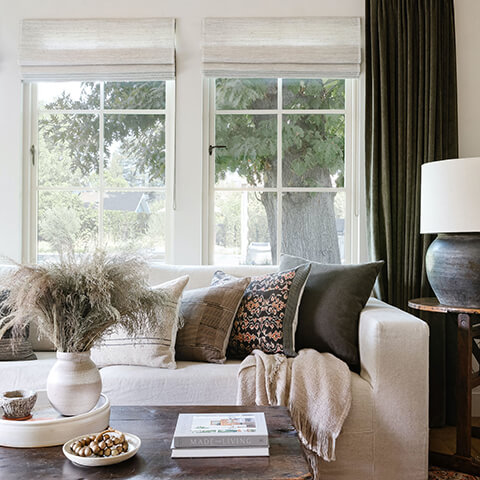 A seating area in Amber Lewis’s Calabasas, California home, featuring Marvin windows.