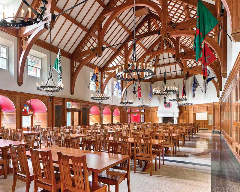 The interior of The Lawrenceville School Abbott Dining Hall features Marvin Ultimate Casement windows, Marvin Ultimate Awning windows, and Marvin Ultimate Double Hung windows and includes historic details to match the rest of the campus.