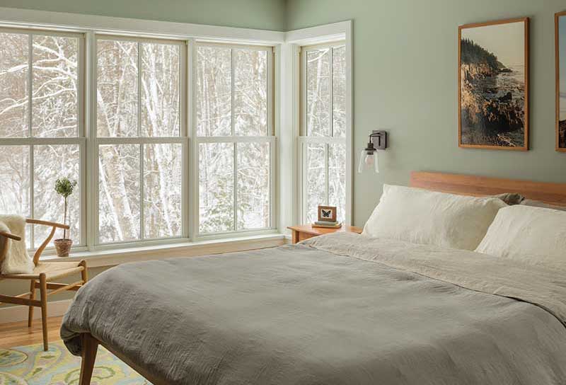 Marvin Elevate Double Hung windows in a bedroom in winter.