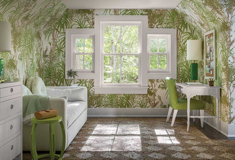 Marvin Ultimate Double Hung windows in a study with green plant wallpaper.