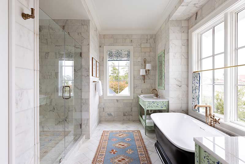 The main bathroom in the 2022 Southern Living Idea House, featuring Marvin Elevate Casement windows.