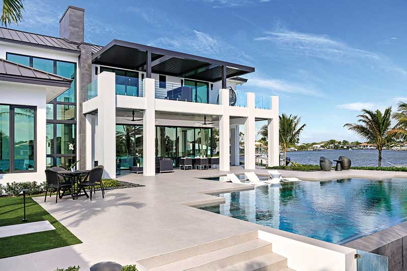 A coastal home in Florida featuring Marvin Coastline windows and doors.