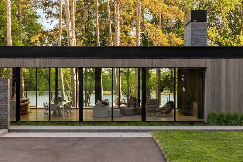 A modern home on Lake Minnetonka with Marvin Modern Multi Slide Doors and Marvin Modern Direct Glaze windows.
