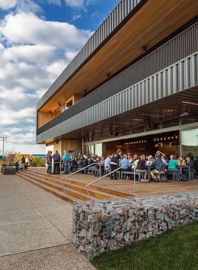 Exterior patio of Surly Brewing Co. with open Marvin Signature Ultimate Lift and Slide Door