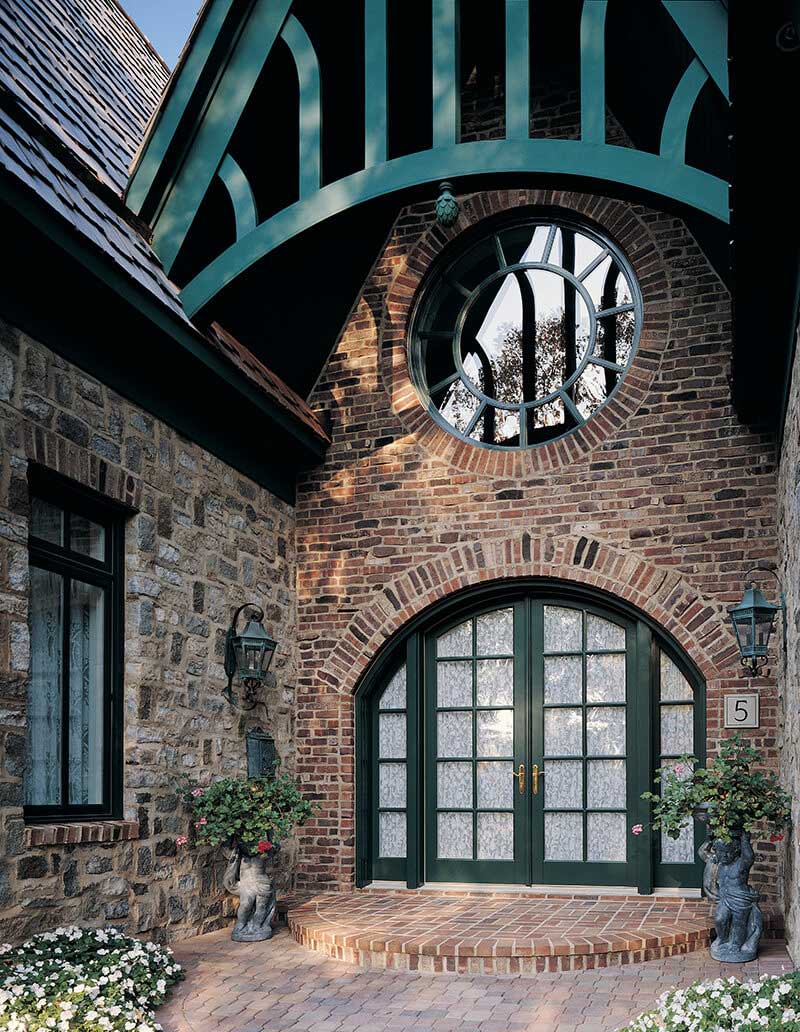A close-up shot of a Marvin Arch Top French Door.
