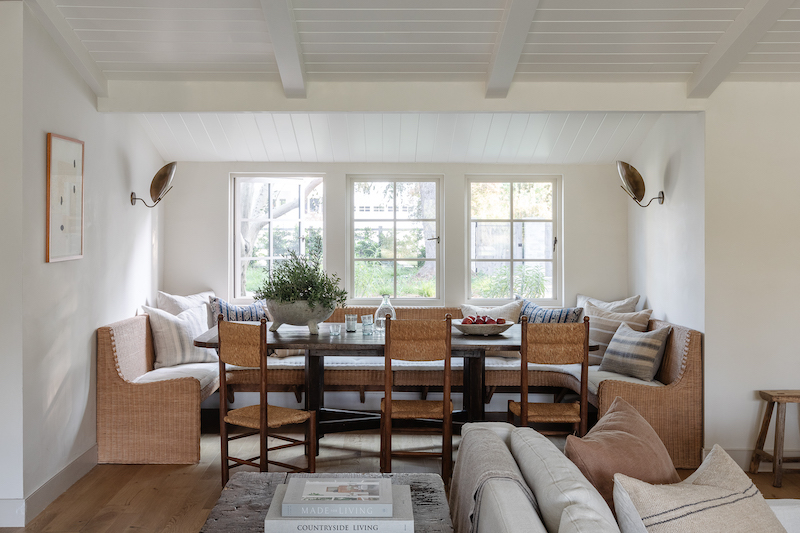 The dining room in Amber Lewis’s farmhouse-style home, featuring Marvin Signature Ultimate Casement windows.
