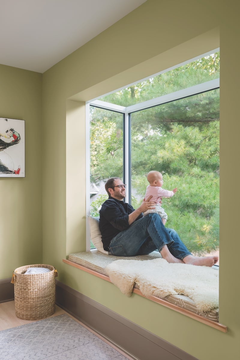A father and daughter sitting in Marvin Skycove in their Southwest Minneapolis home.