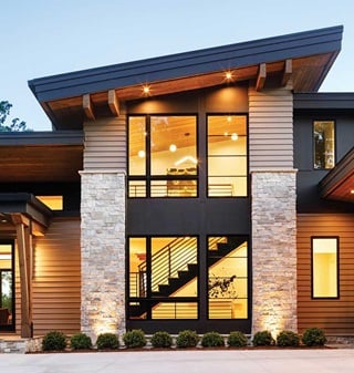 Marvin Elevate Awning windows, Marvin Elevate Casement windows, and Marvin Elevate Picture windows are mulled together to create a wall of windows in a contemporary home.
