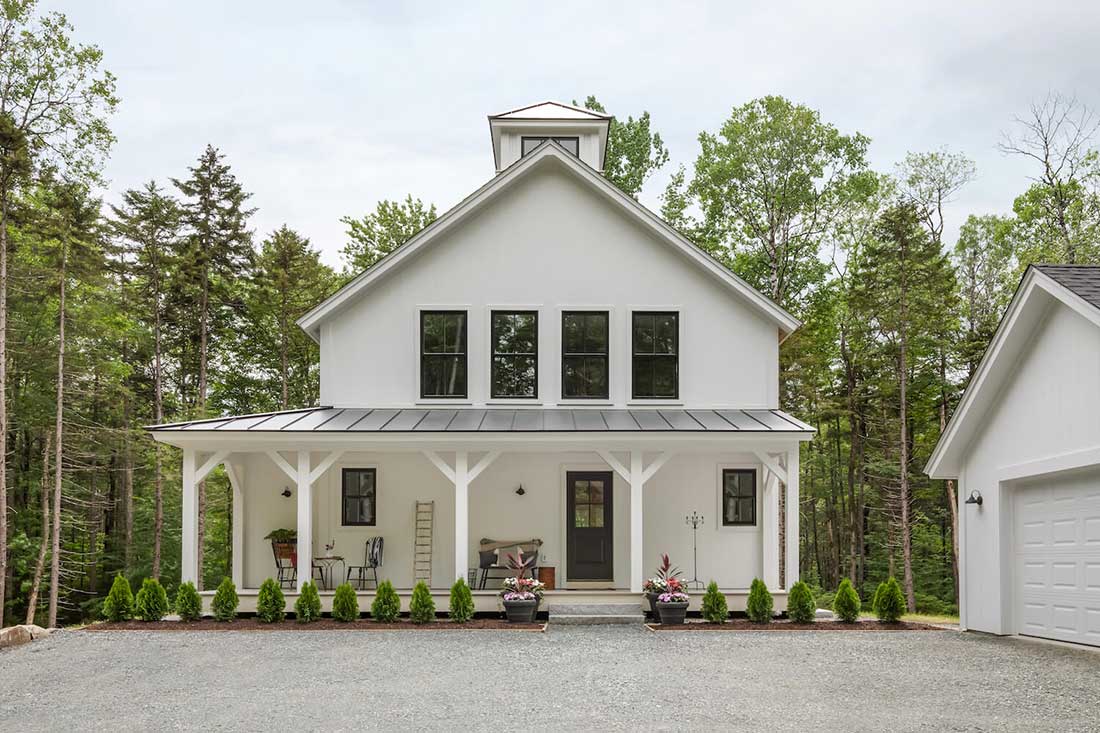 White Farmhouse with Marvin Windows and Doors