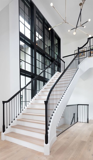 Modern style staircase with multiple large Marvin Windows