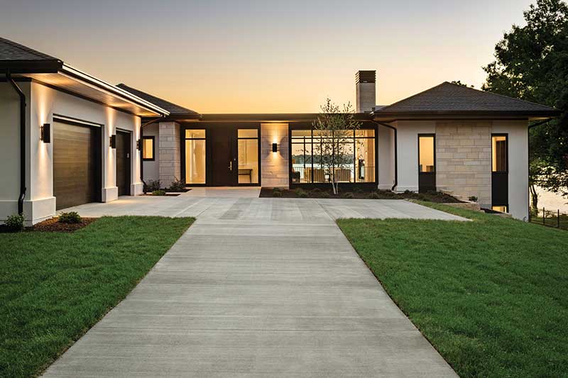 A modern home on Lake Minnetonka built by John Kraemer and Sons for aging in place, featuring Marvin Modern Direct Glaze and Modern Casement windows.  