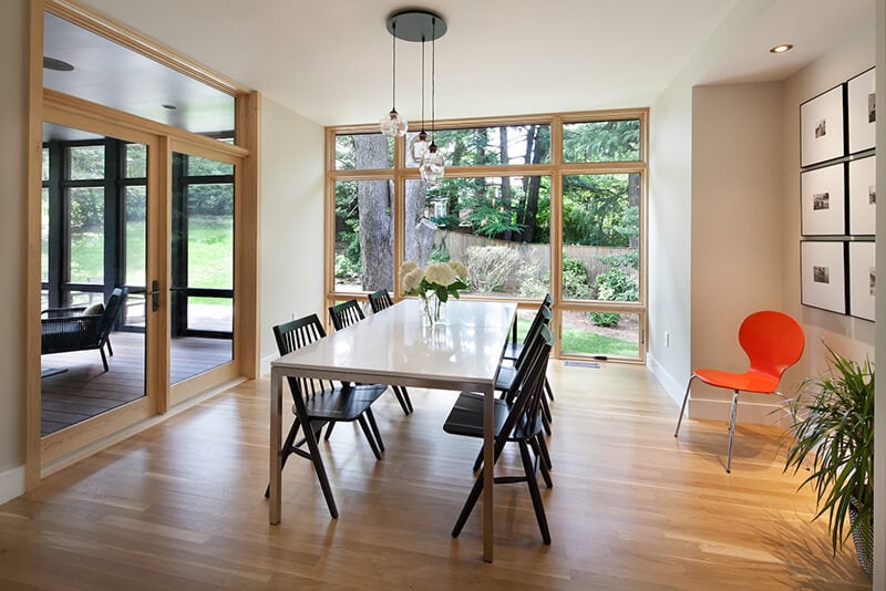 Dining room area with multiple Marvin Windows and Doors