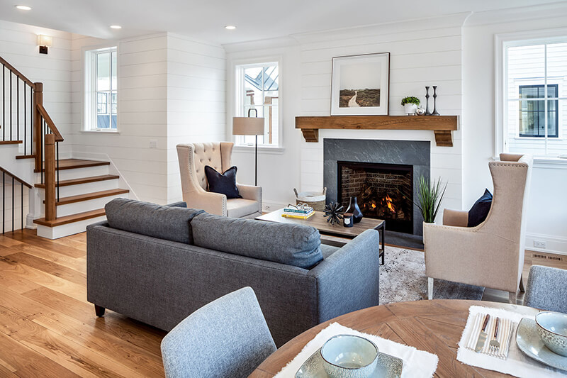 Kate Gelfand Designed living room with touches of white oak and multiple Marvin Windows