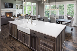 Large open concept kitchen with large Marvin Windows