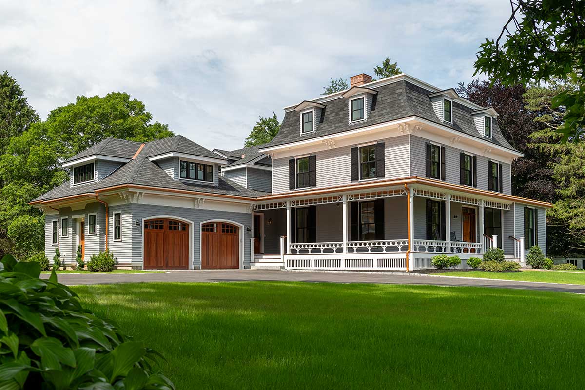 The exterior of Hadley House in Wenham, Massachusetts, with its garage addition adjacent to the historic home.