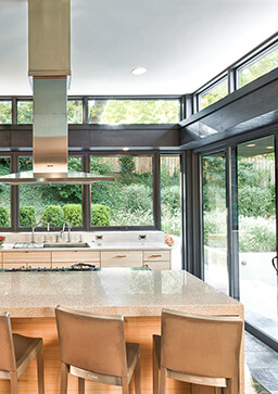 Open concept kitchen with large Marvin Windows and Doors