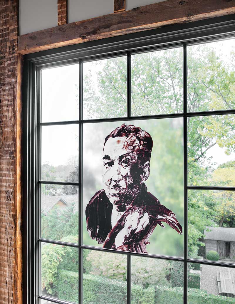 A portrait of Langston Hughes, transferred onto translucent film and positioned in a custom Marvin Ultimate window in The Church, a modern center for the arts in Sag Harbor, NY.