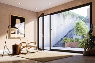 A lower level sitting room in a home looking out to a garden space through a Marvin Modern Inswing door.