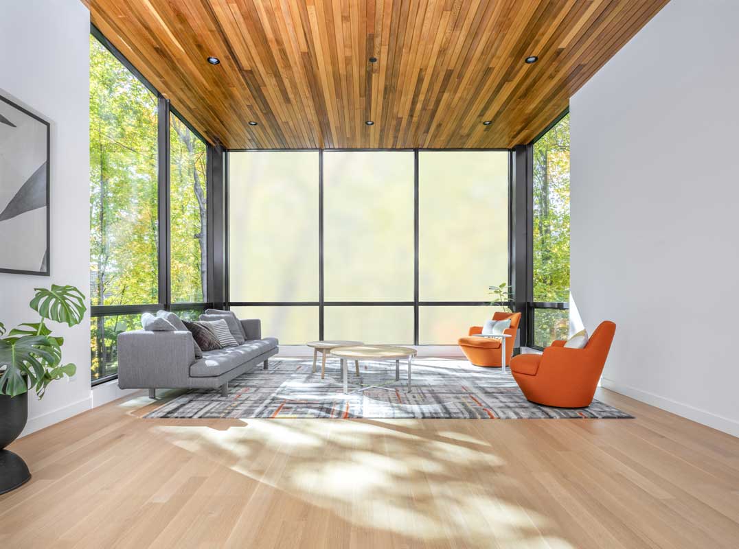 A modern porch featuring Marvin Modern Direct Glaze windows.