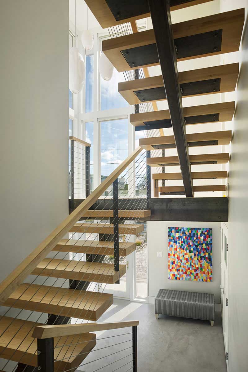 Stairway view of home with multiple Marvin Windows and Doors