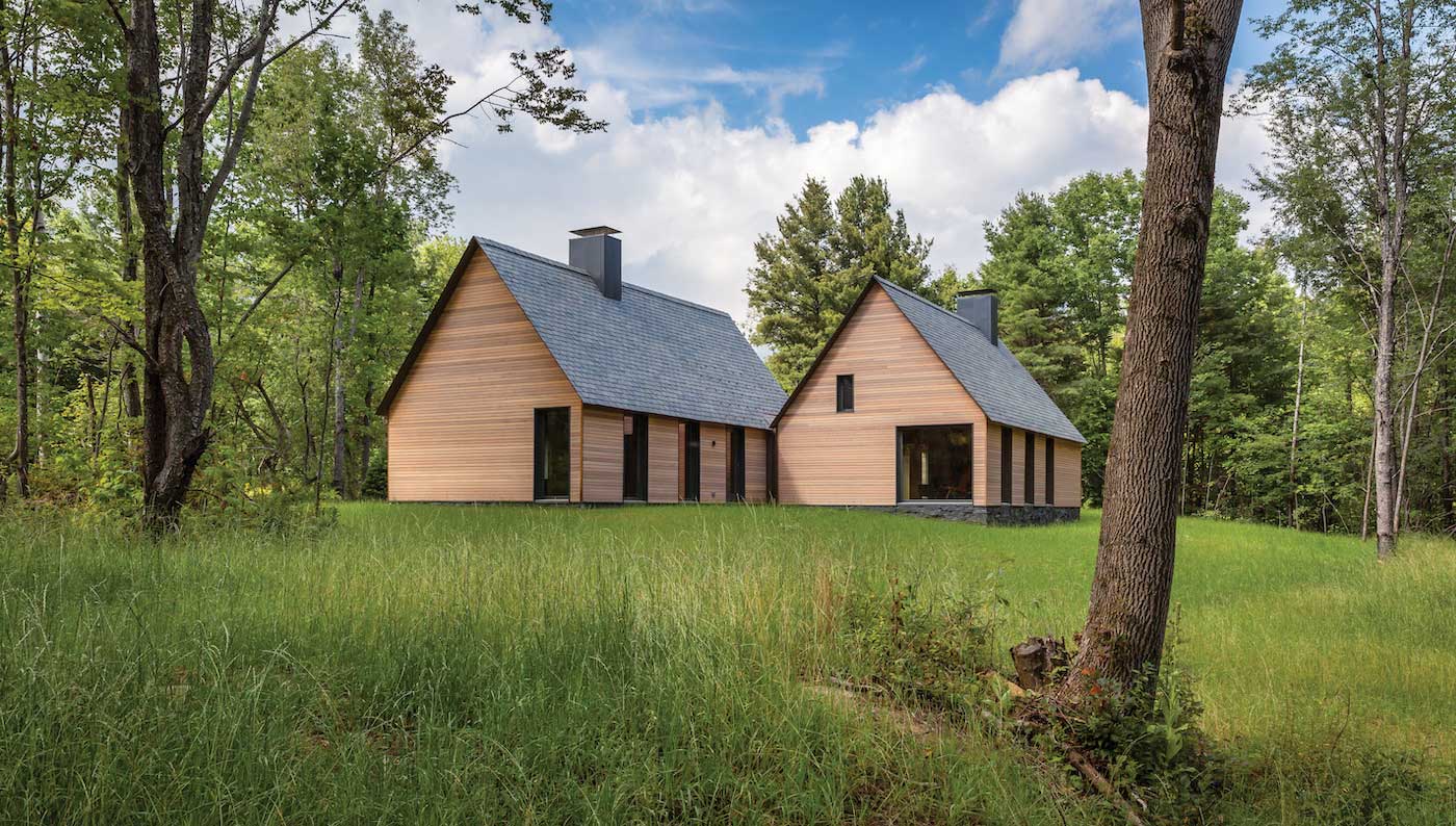 An exterior photo of the Marlboro Music Cottages in Vermont, featuring Marvin Ultimate Casement windows and Ultimate Picture windows