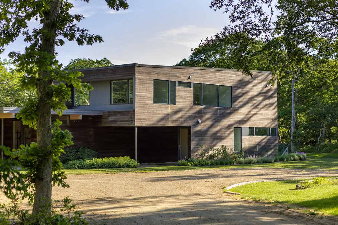 Exterior of a Turkel prefab home in Martha’s Vineyard featuring Marvin windows and doors.