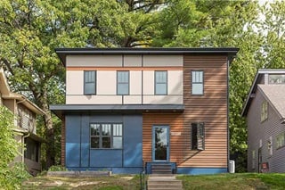 An exterior photo of a modern home in southwest Minneapolis, featuring Marvin windows, doors and Skycove.
