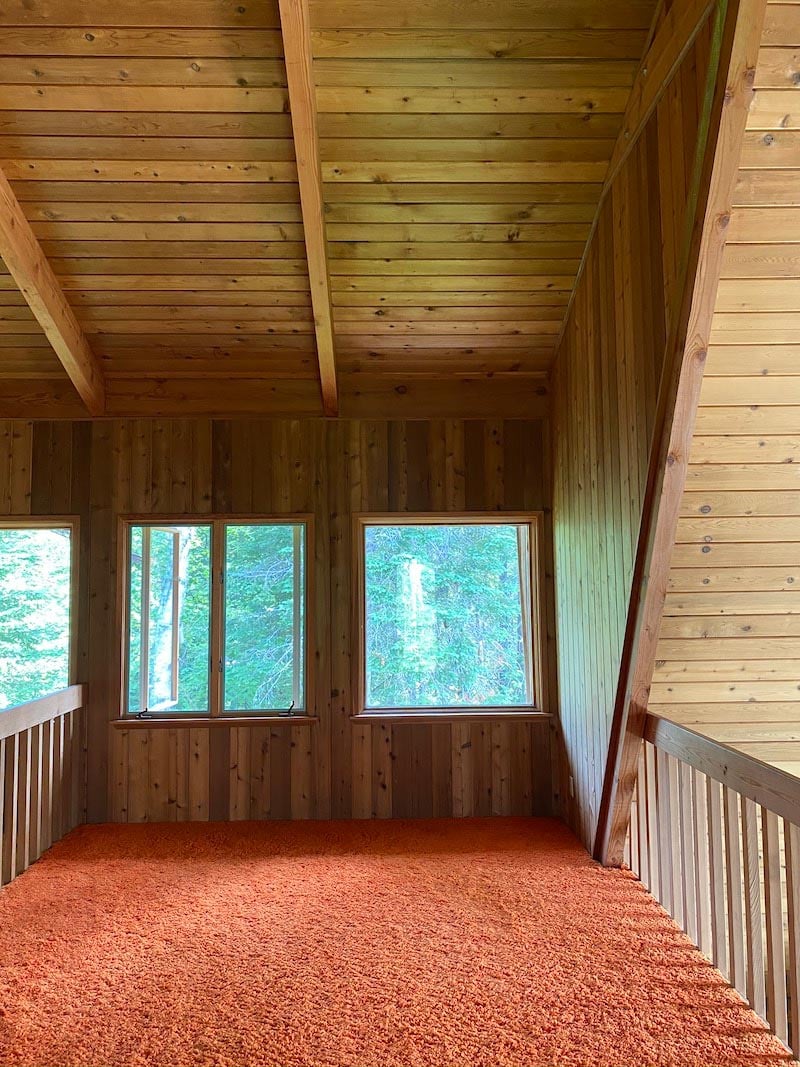 Before images of The Minne Stuga cabin with orange shag carpet