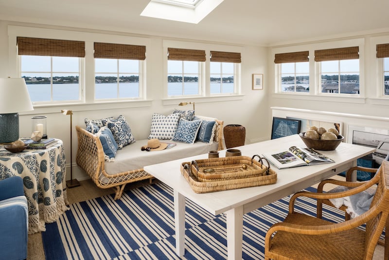 A nautical-themed lounge featuring Marvin Signature Ultimate casement windows.