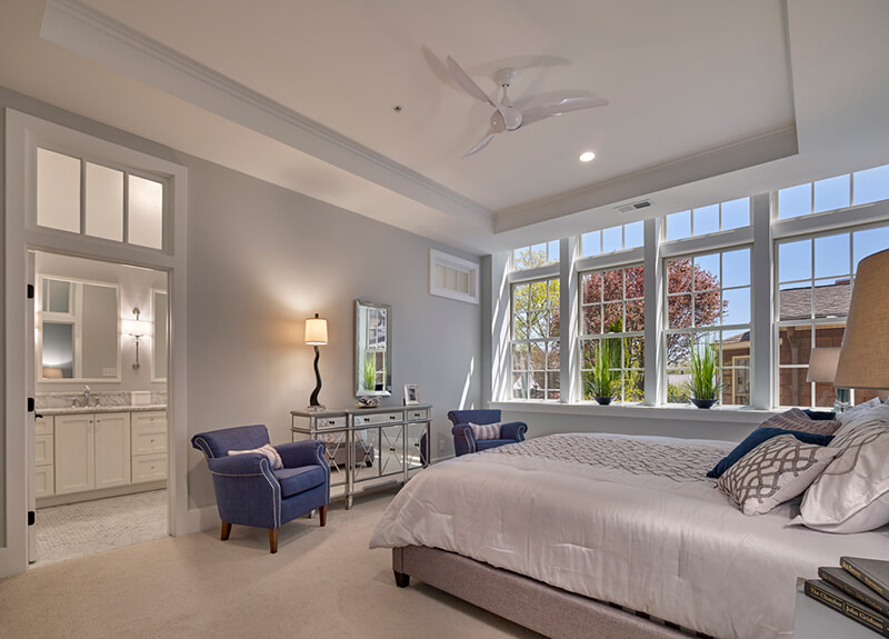 Large bedroom with multiple large Marvin Windows