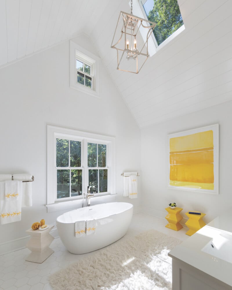 Modern style bathroom with vaulted ceiling and Marvin Windows