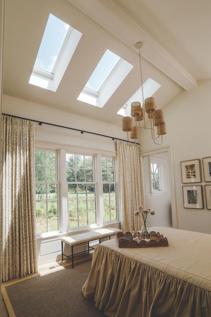 Three Marvin Awaken Skylights and Marvin Ultimate Double Hung Windows in a bedroom, 2021 Southern Living Idea House