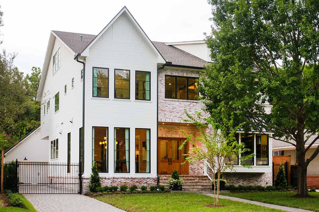 Exterior of a Modern Farmhouse style home in Houston, Texas, featuring Marvin windows.