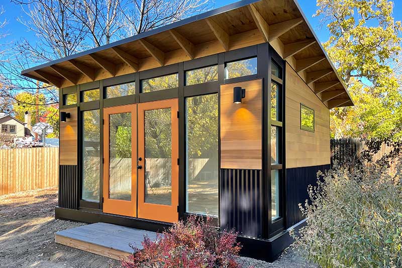 A contemporary Accessory Dwelling Unit (ADU) from Studio Shed featuring Marvin Essential windows.