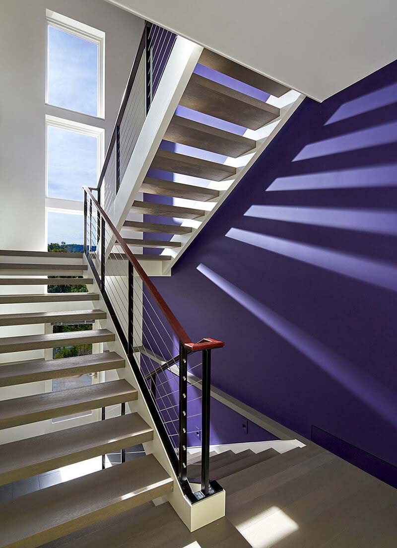 Stairwell view of Modern style home with multiple Marvin Windows and Doors