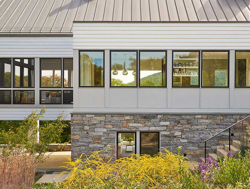 Close up of modern style home with multiple Marvin Windows and Doors
