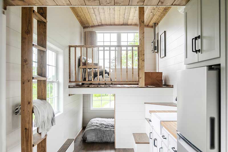 An efficient use of space inside a Wind River Tiny Home, featuring Marvin windows.