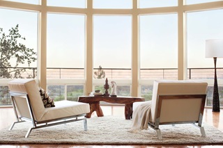 Marvin Essential Glider window and Marvin Essential Single Hung window in a contemporary living room.