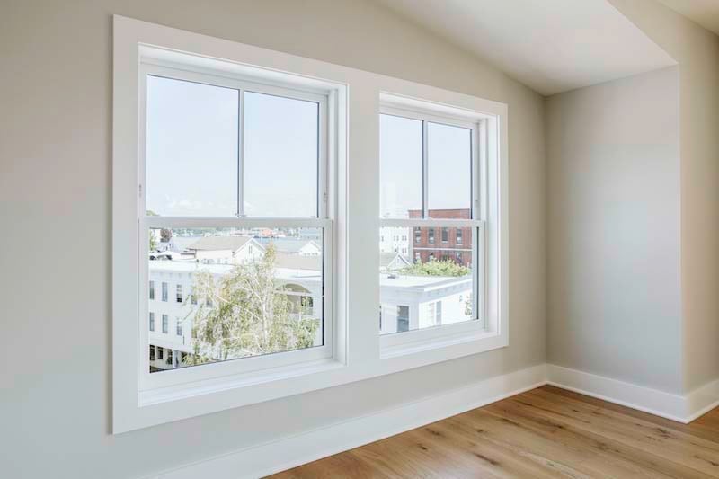 Marvin Ultimate Double Hung windows overlooking a downtown main street.