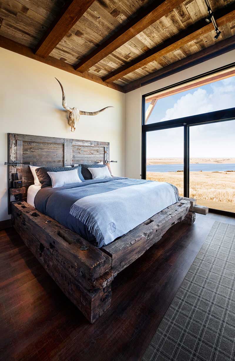 Modern rustic style bedroom with large Marvin Window and Door