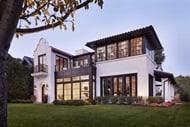 The exterior of a modern home featuring marvin windows and doors