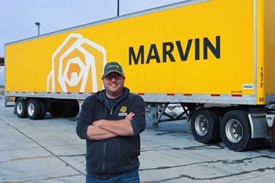 Marvin truck driver standing in front of Marvin semi-truck